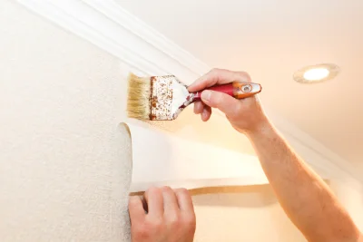 Pose de papier peint au Perrey — revêtements muraux et toiles de verre